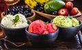 Vegan ice cream made with organic fruits, with tropical fruits in the background, flavors of strawberry, banana, jabuticaba and Royalty Free Stock Photo