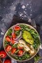 Vegan lentil meatballs salad with kale, avocado, tomato and tahini dressing. Royalty Free Stock Photo