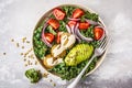 Vegan lentil meatballs salad with kale, avocado, tomato and tahini dressing. Royalty Free Stock Photo