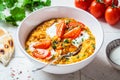 Vegan lentil soup with cilantro and tomato. Dal soup with tomatoes. Indian cuisine concept Royalty Free Stock Photo