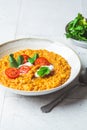 Vegan lentil soup with cilantro and tomato. Dal soup with tomatoes. Indian cuisine concept Royalty Free Stock Photo