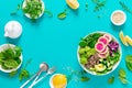 Vegan lunch bowl with quinoa, cucumber, green peas, radish, romanesco and red cabbage, avocado, spinach and arugula salad, healthy Royalty Free Stock Photo