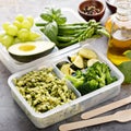 Vegan meal prep containers with pasta and vegetables Royalty Free Stock Photo