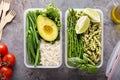 Vegan meal prep containers with rice, pasta and vegetables Royalty Free Stock Photo