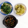 Vegan daily meal, straw mushroom cook with sauce, choy sum soup, rice bowl, pickled mustard green, simple vegetarian Vietnamese