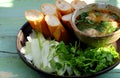 Vegan meatballs soup with bread, vegetarian dish from tofu for healthy eating