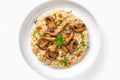 Vegan Mushroom Risotto On White Round Plate On White Background