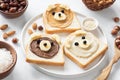 Vegan nut butter toasts with animal faces. Healthy breakfast for kids Royalty Free Stock Photo