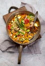 Vegan Paella on gray background Royalty Free Stock Photo