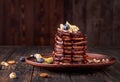 Vegan pancakes based avocado with cocoa and date syrup. Vegan healthy sweet food