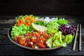 Vegan poke bowl with marinated watermelon, edamame, avocado, seaweed and carrot noodles