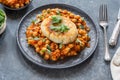 Vegan potato cake and chickpea curry