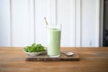 vegan protein smoothie with pea powder, kale, and almond milk