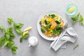 Vegan quinoa and broccoli warm salad with oranges and fresh onion Royalty Free Stock Photo