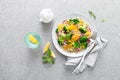 Vegan quinoa and broccoli warm salad with oranges and fresh onion Royalty Free Stock Photo
