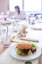 Vegan quinoa burger in a restaurant Royalty Free Stock Photo