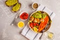 Vegan Rainbow bowl: vegetable meatballs, avocado, sweet potato a