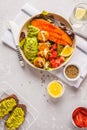 Vegan Rainbow bowl: vegetable meatballs, avocado, sweet potato a