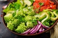 Vegan salad of fresh vegetables and cabbage romanesko. Royalty Free Stock Photo