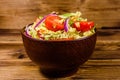 Vegan salad with savoy cabbage, tomatoes and onion in a ceramic bowl Royalty Free Stock Photo