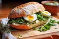 Vegan sandwich egg salad cucumber on wooden table. Generative AI Royalty Free Stock Photo