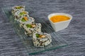 Vegan sushi on glass plate with sauce Royalty Free Stock Photo