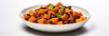 Vegan Sweet Potato And Black Bean Chili On White Round Plate On White Background Royalty Free Stock Photo