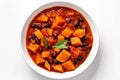 Vegan Sweet Potato And Black Bean Chili On White Round Plate On White Background. Generative AI Royalty Free Stock Photo