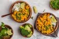 Vegan Sweet Potato Chickpea curry in wooden bowl on a light back Royalty Free Stock Photo