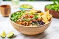 vegan taco salad in an edible bowl