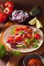 Vegan taco with vegetable, kidney beans and salsa