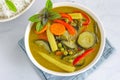 Vegan Thai Green Curry with Rice, Garnished with Thai Basil