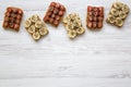 Vegan toasts with peanut butter, bananas, strawberries and chia seeds on a white wooden surface, from above. Healthy breakfast Royalty Free Stock Photo