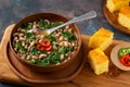 Vegan US southern black-eye peas and collard greens with corn bread