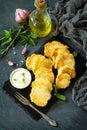 Vegan vegetable fritters on a background of slate cutting board. Fried vegetarian cutlets or pancakes. Royalty Free Stock Photo