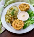 Vegan vegetable muffins with light chili-mayo dip and cucumber pickle salad