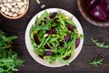 Vegan vegetable vitamin salad from beets, arugula and pistachios