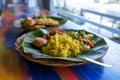 Vegan or vegetarian restaurant dishes side view, hot spicy indian rice in bowl. Healthy traditional eastern local food Royalty Free Stock Photo