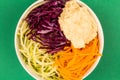 Vegan or Vegetarian Salad Bowl With Red Cabbage Courgettes Carrots And Hummus Royalty Free Stock Photo