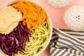 Vegan or Vegetarian Salad Bowl With Red Cabbage Courgettes Carrots And Hummus Royalty Free Stock Photo