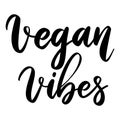 Vegan vibes. Lettering phrase on white background. Design element for greeting card, t shirt, poster.