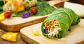 Vegan wrap made with kale or lettuce leaf, stuffed with various vegetables, healthy fast food Royalty Free Stock Photo