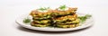 Vegan Zucchini Fritters On White Round Plate On White Background