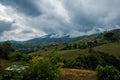 Vegetable Agriculture terrace farming in the village hill of forest mountain with cloudy sky