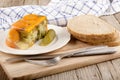 Vegetable aspic and bread on a wooden board