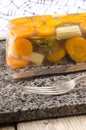 Vegetable in aspic and cutlery