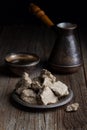 Vegetable-based halva sweet prepared from seeds on wooden background