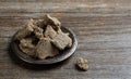 Vegetable-based halva sweet prepared from seeds on wooden background