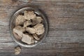 Vegetable-based halva sweet prepared from seeds on wooden background, top view