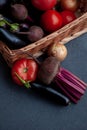 Vegetable basket. Fresh vegetables on the table black background. Set of food delivery box. Broccoli, cabbage, eggplant Royalty Free Stock Photo